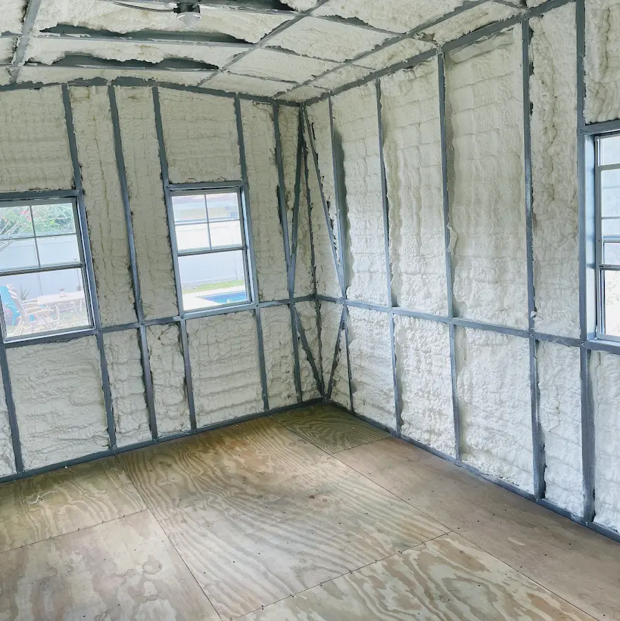 Closed-cell spray foam insulation applied to wall cavities in a residential project in Riverton